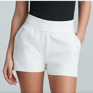 faux leather shorts are made with a four-way stretch faux leather.